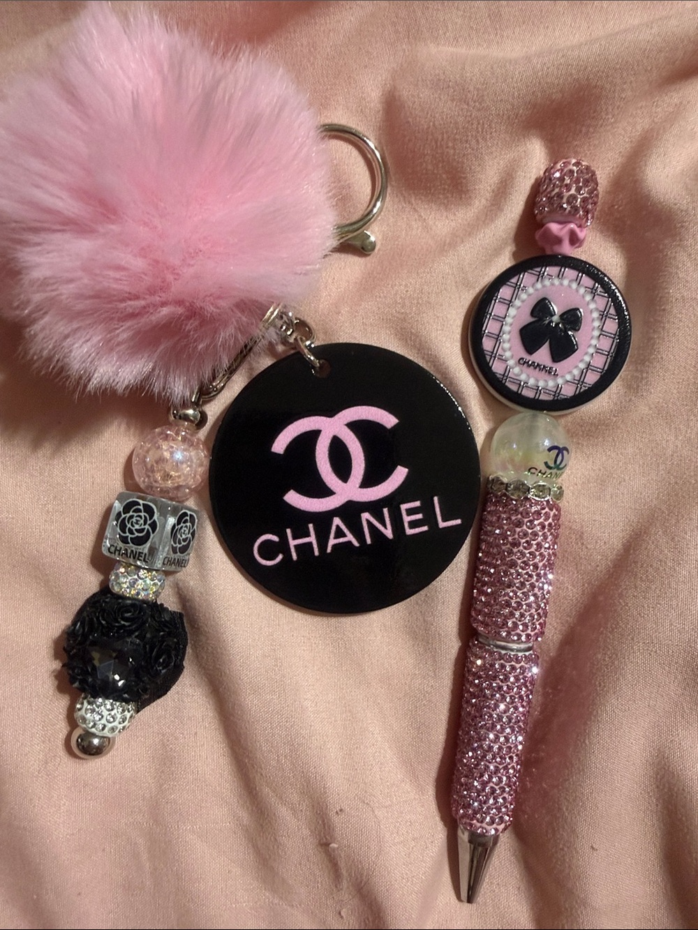 Black & pink matching keychain and rhinestone pen with extra refill.